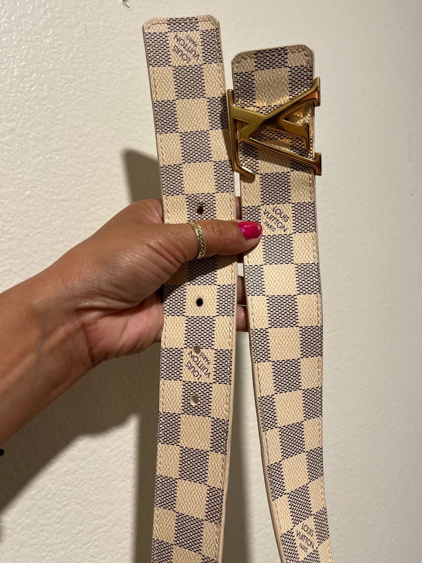 The item pictured is a Louis Vuitton Damier Azur canvas belt 