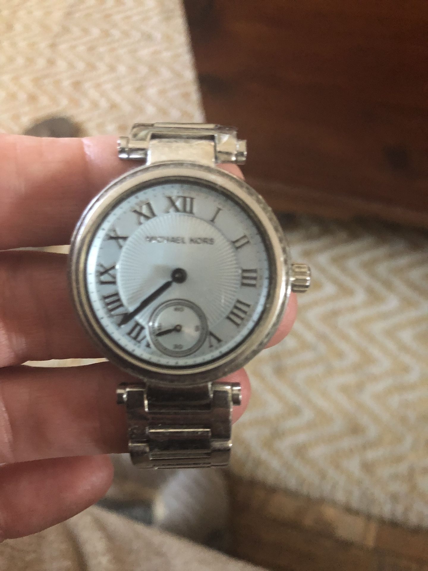 Michael Kors watch, silver and light blue. Small faced watch, great for teens or woman with smaller wrists. Needs battery replacement but works great