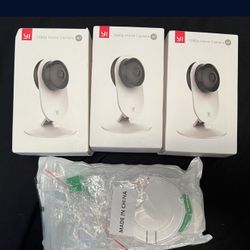 3 home security camera’s  and wall mounts