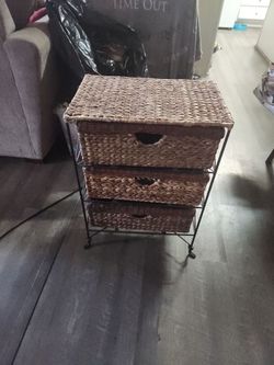 Small metal shelf with 3 baskets