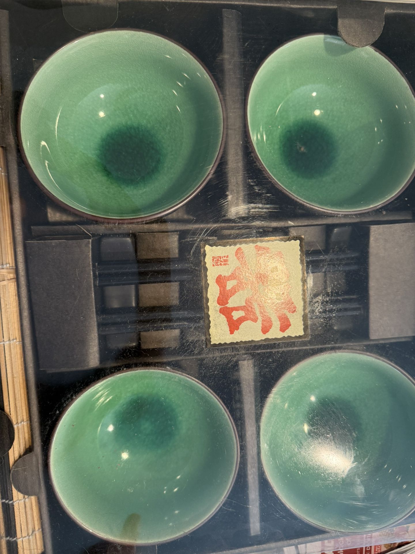 Asian bowl set with chopsticks, holders and placemats