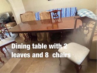 Dining table with two leaves and 8  chairs  -  $350