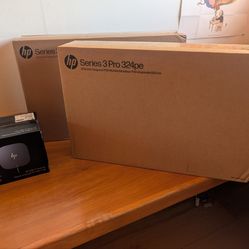 Two Brand new 2025 HP Monitors and a  Docking Stations.