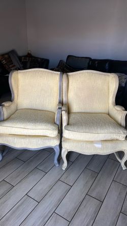 2 yellow sofas