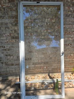 Glass storm door