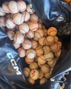 137 damaged baseballs - good for soft toss BP
