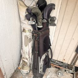 Two Sets Of Golf Clubs