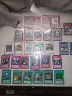 30 first edition hologram/foil Yu-Gi-Oh cards