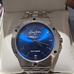 SEAN JOHN WATCH SILVER WITH A GUNUINE BLACK DIAMOND