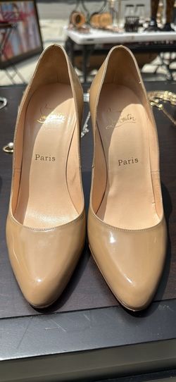 Christian (Louboutin)