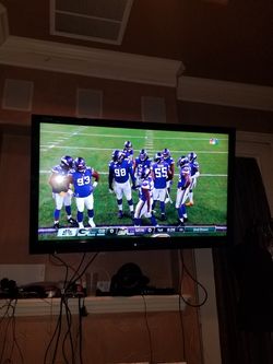 60 inch Sharp TV and remote