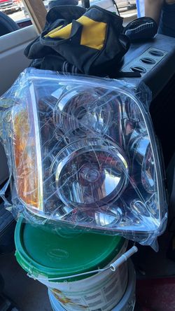07 GMC Headlight