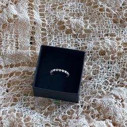 Beautiful, size 5 moissanite, eternity ring set in 925 sterling silver.