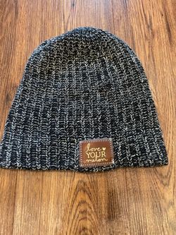 Black and white speckled Love Your Melon un-cuffed knit slouch beanie