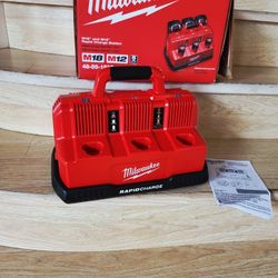 Milwaukee brand new and M18 12-Volt/18-Volt Lithium-Ion Multi-Voltage 6-Port Sequential Rapid Battery Charger (3 M12 and 3 M18 Ports)p