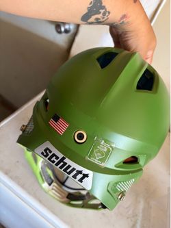 Schutt Viper softball/baseball helmet with face guard and mirrored visor.