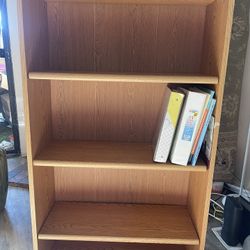 4-shelf bookshelf in good condition. Sturdy and clean. Great for books, storage, or décor. Moving sale.