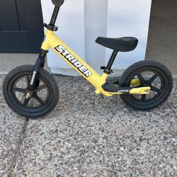 Yellow Strider Balance Bike 