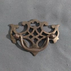 Antique Brass Batwing Bail Drop Drawer Pull Handle, 2" C2C, 3" Overall Lengrh. Normal wear and tear. Scratches,nicks and dents MAY be seen. Cleaning M