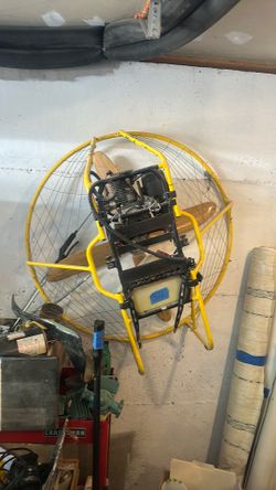 Back pack powered parachute