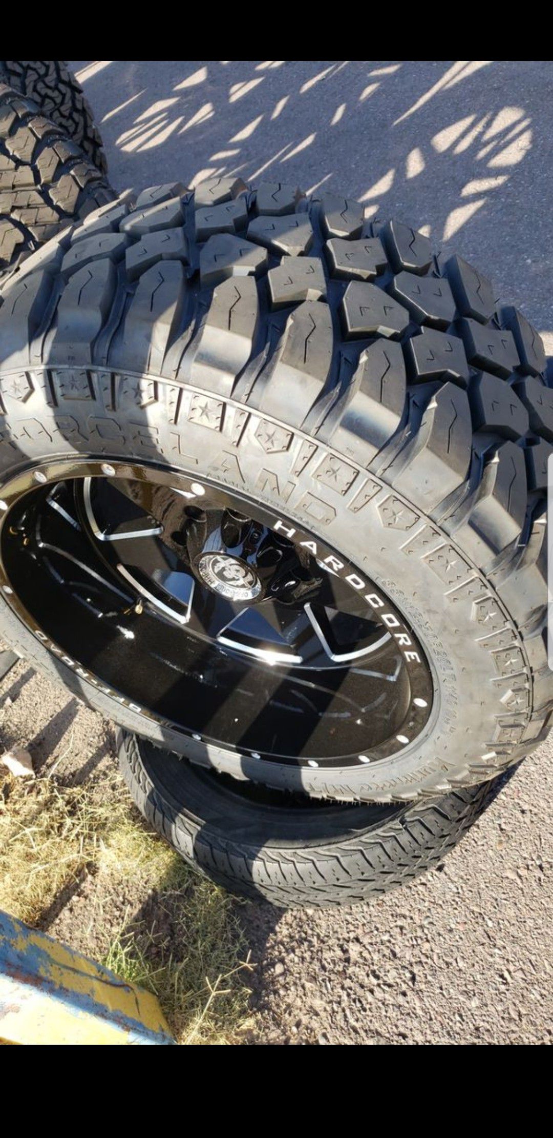 20x12 black hardcore offroad rims 8 lug 8x165 wiht New MUD tires 33 1250 20