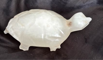 White stone engraved turtle