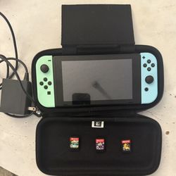 Nintendo Switch (Animal crossing Edition) + 3 Games & Case - 275