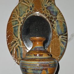 decorative ceramic wall plaque with an attached miniature vase And Mirror 