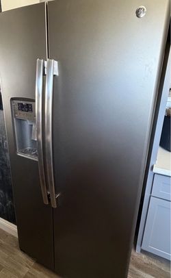 FREE GE Side-by-Side Refrigerator with Ice and Water Dispenser