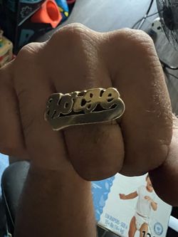 14k mends ring with name “JORGE”