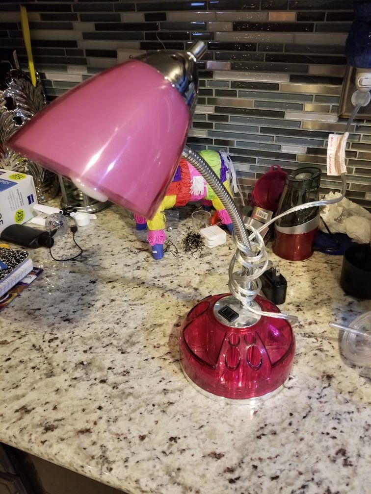 Pink desk lamp.