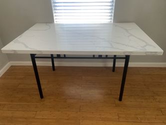 Real marble table with steel legs