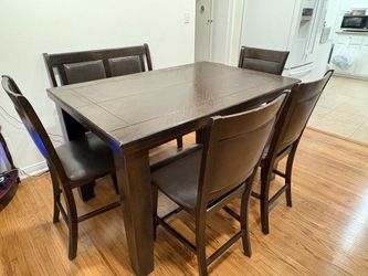 Dining table with chairs and bench