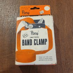 Pony Band (Miter) Clamp 1215 15 Ft Strap Capacity Open Box . UPC 
07.
I am not sure whether it was used, looks pretty new. See the photos. 
