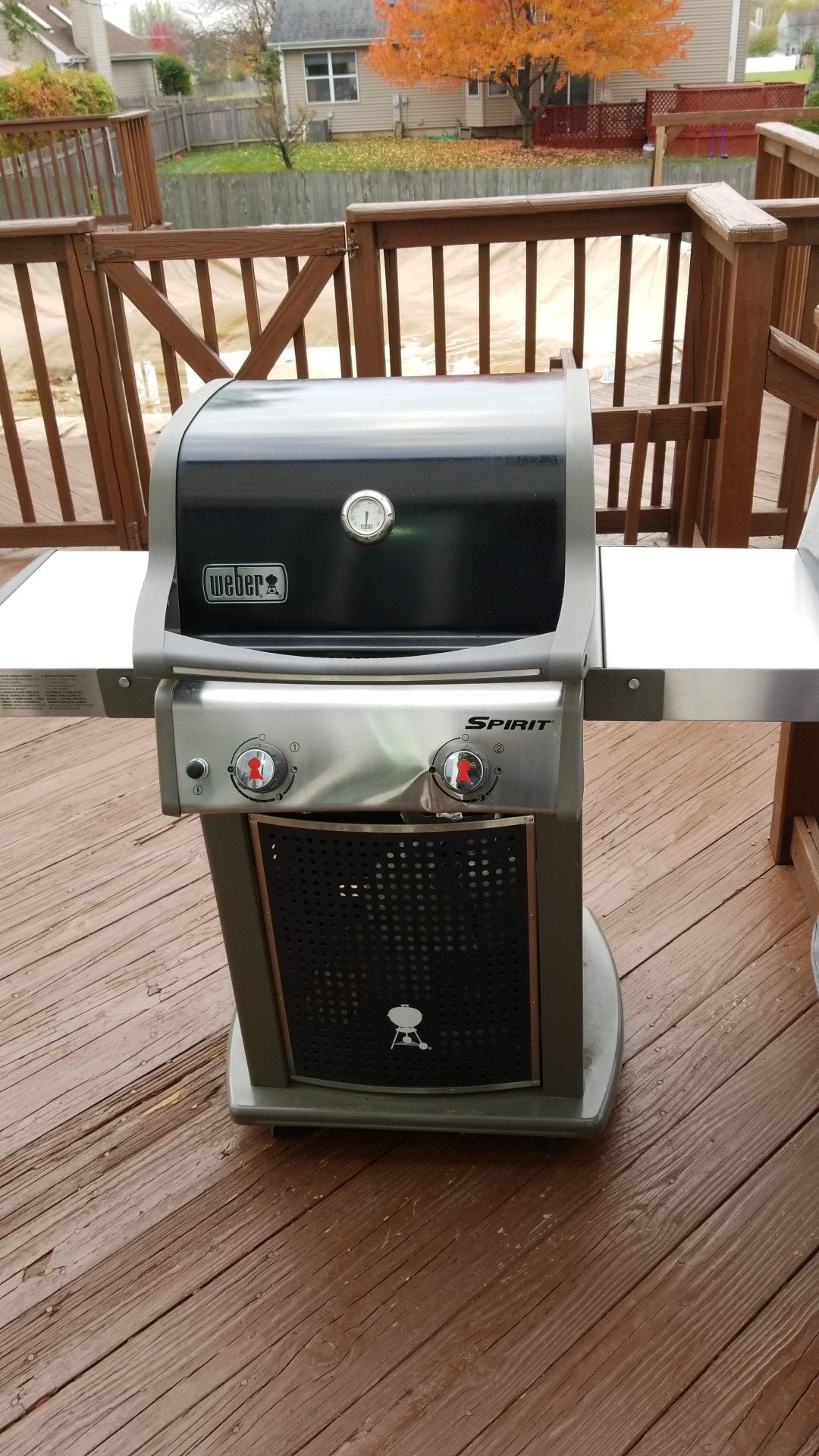 Weber spirit grill with cover and propane tank