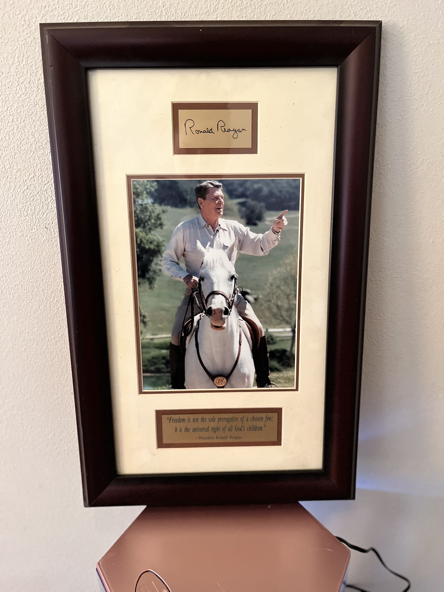 Ronald Reagan riding a horse autographed L framed photo