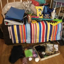 A Lot Of Stuff For The Classroom , A Nice Colorful Cover, Pencils , Crayons , Folders Big Letters And More