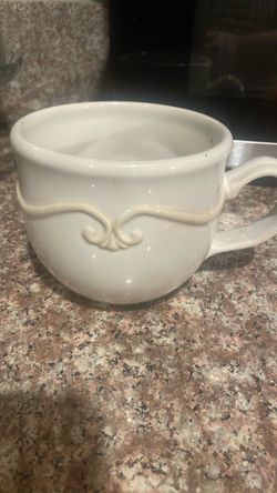 White Ceramic Mug with Embossed Detail