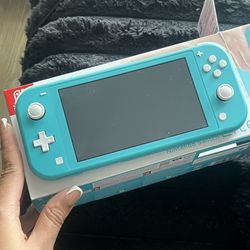Nintendo Switch Lite In Teal