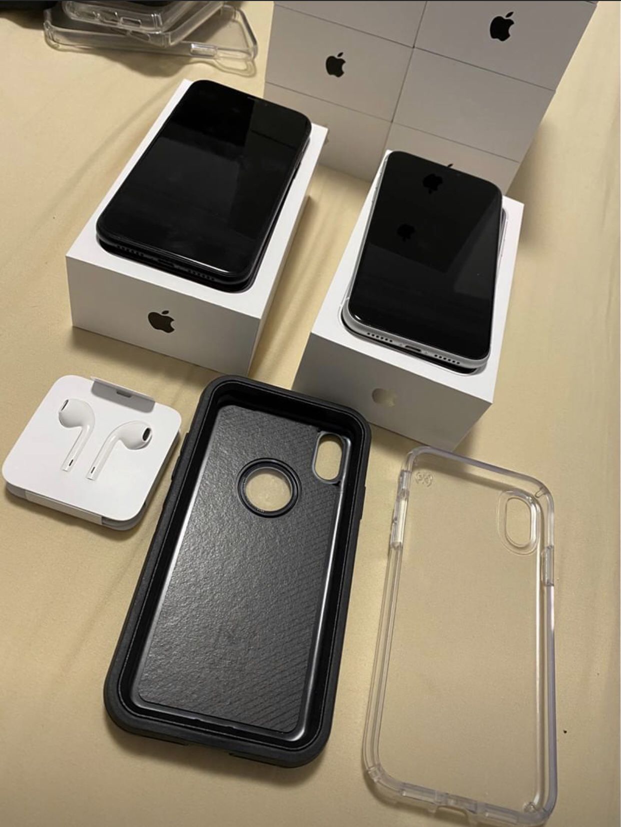 iPhone XR Unlocked with Apple Headphones, Otterbox Case, Screen Protector, and Box