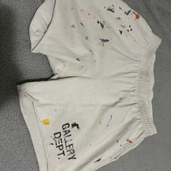 Gallery dept shorts with paint splatter