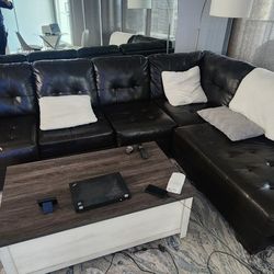 black faux leather L-shaped sectional sofa