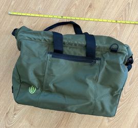 Timbuk2 green duffel bag