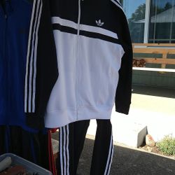 Adidas full jump suits $20 each set. Only Red Left