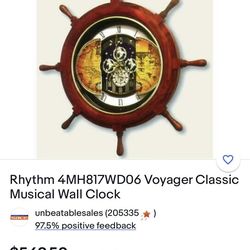 Rhythm Classic Musical Wall Clock