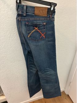 Armani Exchange jeans.