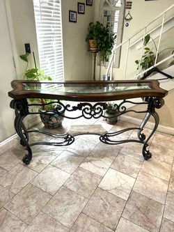 Console table with removable glass top and iron frame and legs with marble down 65” long 22” deep 34” height good condition