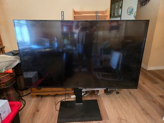 Large Flat Screen TV with Stand