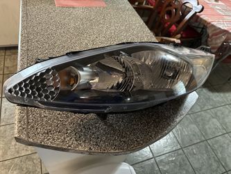 Original front light for Ford Fiesta
