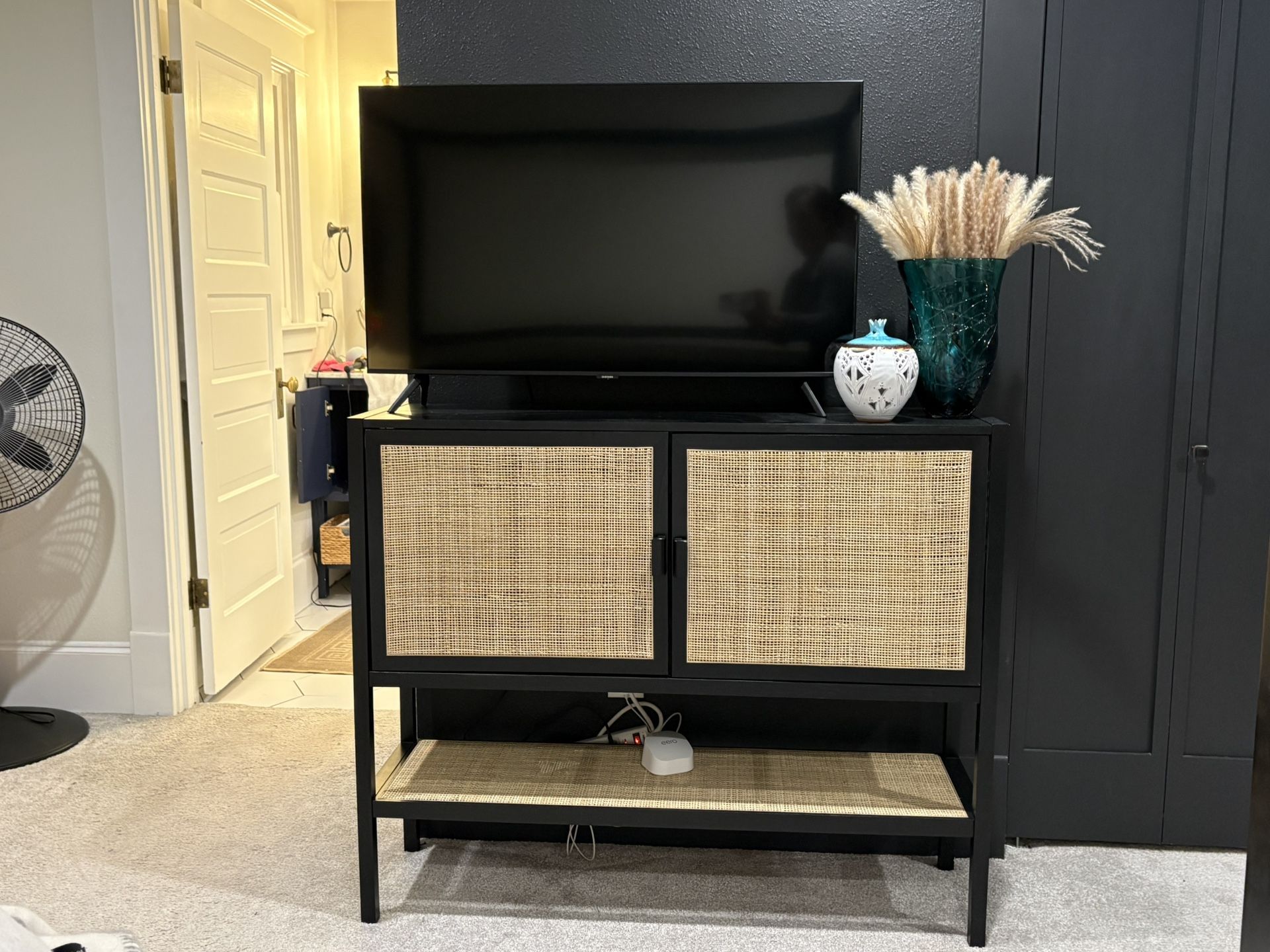 Boho Woven Rattan and Wood Cabinet with 2 Doors, 1 Shelf, and 4 Interior Storage Compartments, Black and Natural